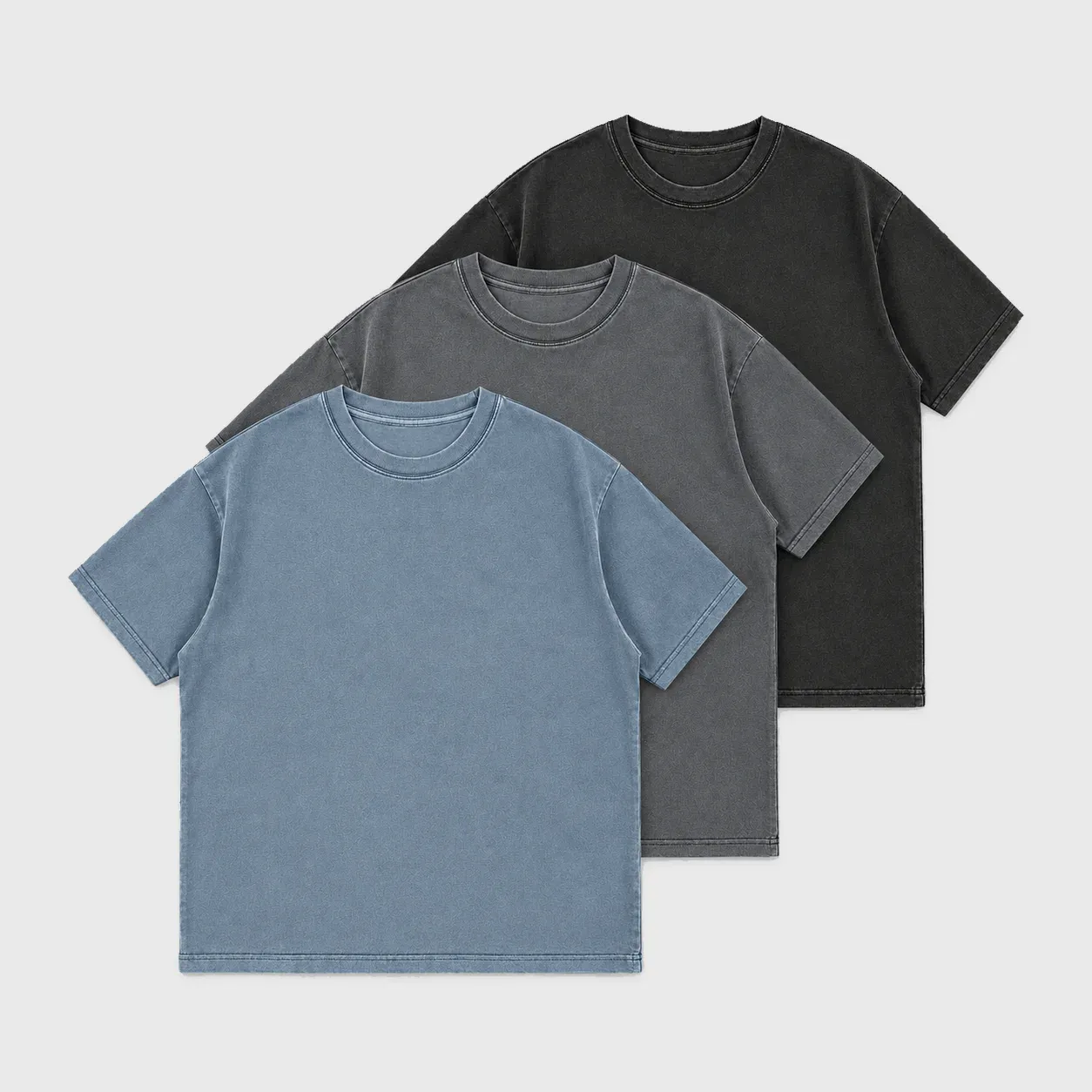 Blue, charcoal and black pigment washed t-shirts layered together