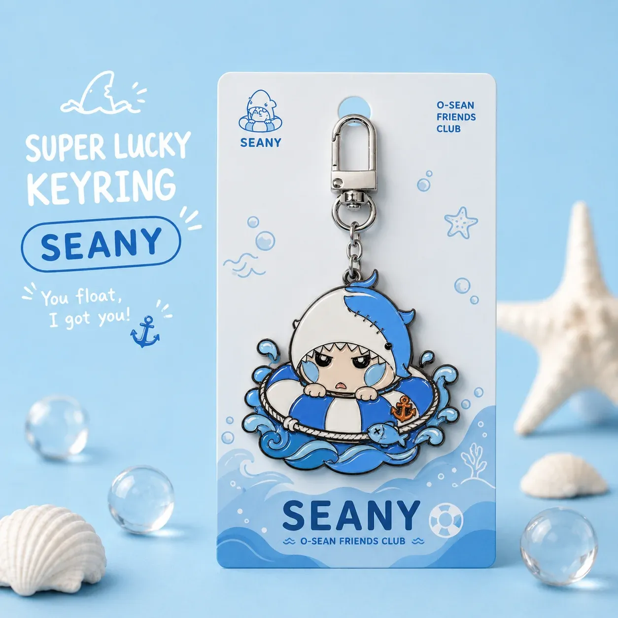 Shark character enamel metal keychain on a backer card package