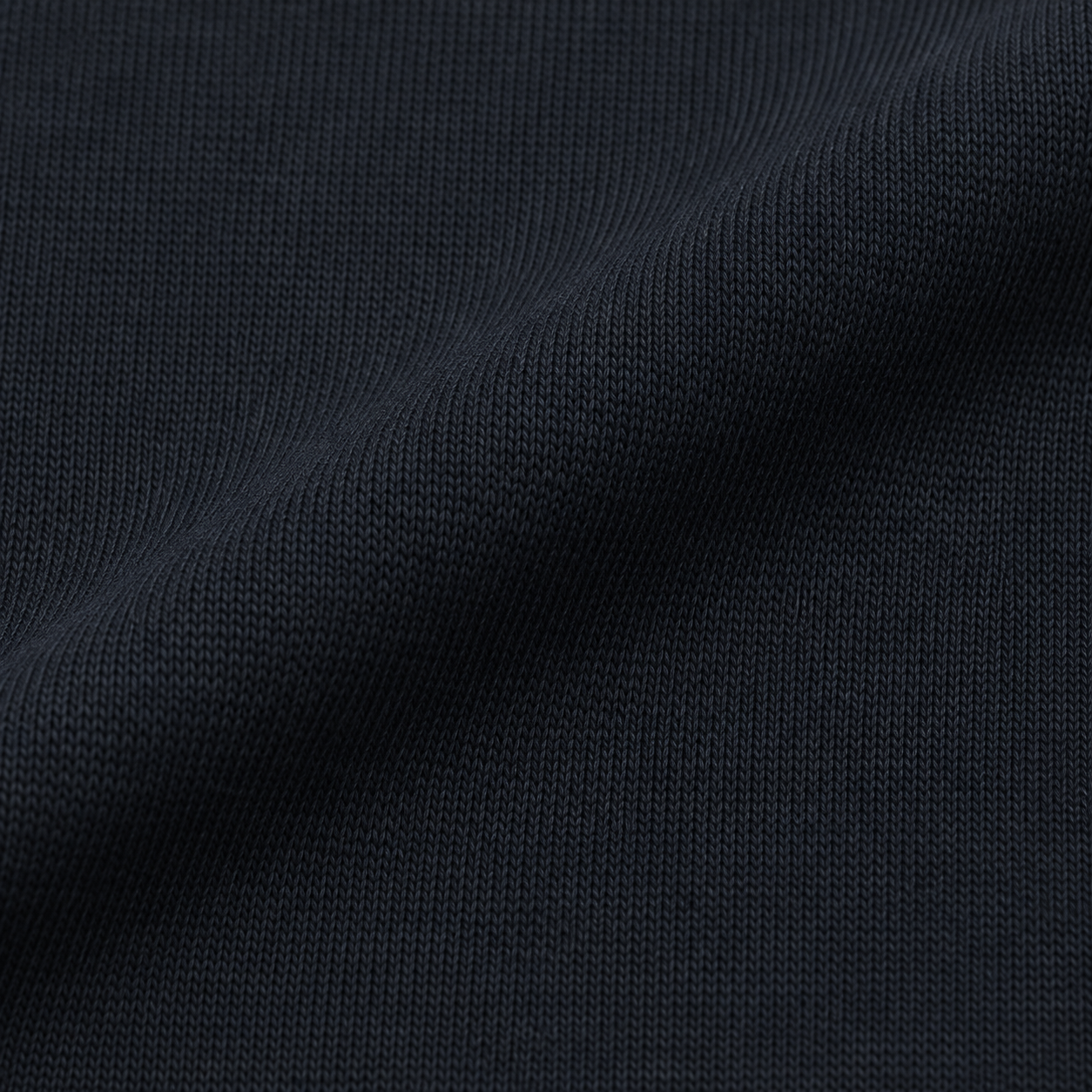 Close-up of navy double-knit fabric texture