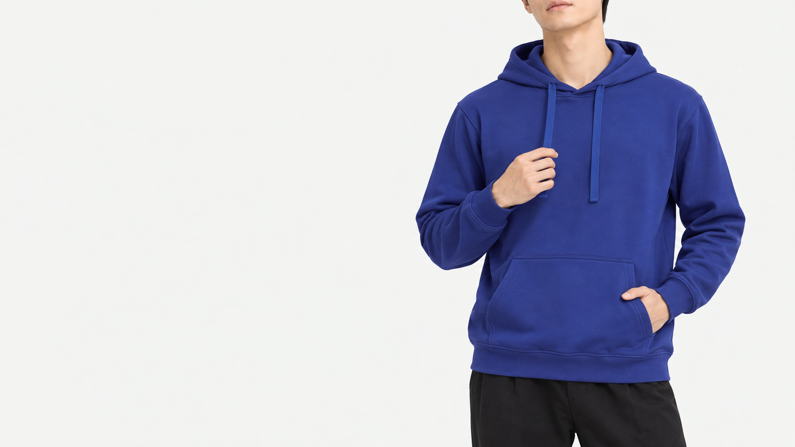 Torso of a man wearing a cobalt blue light hoodie in L, adjusting a drawstring with one hand